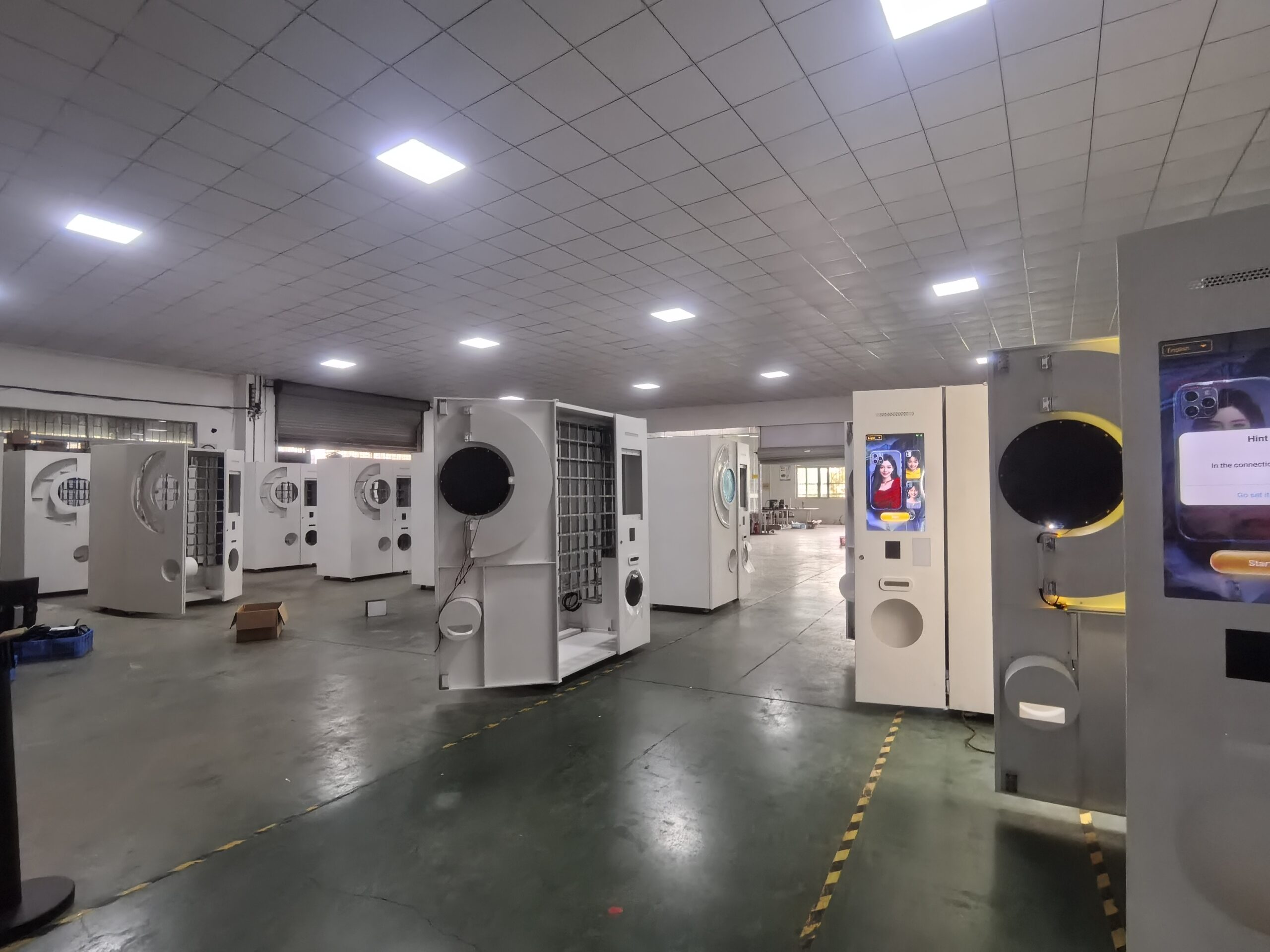 Organized supply cabinet for phone case printing vending machine